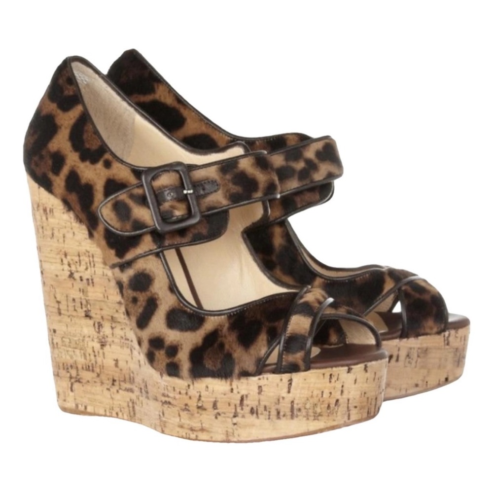 Christian Louboutin Melides Leopard wedges they run on the small side
RETAIL 795